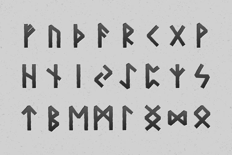 The runic alphabet written in black on a grey background.